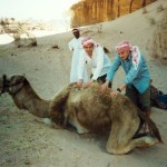 Bill Edwards and Ian Linington massaging a camel